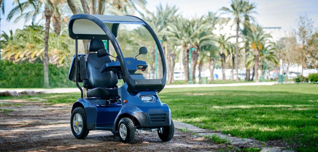 Heavy Duty Mobility scooter parked outdoors
