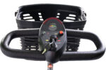 Close-up view of the Roadster 4 control panel with speed dial, battery level indicator, forward/reverse switch, and ignition key above the front basket.