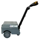 Side view of the Pony Express 1065 Electric Powered Tugger showing compact gray body, large rear wheels, and ergonomic handle.